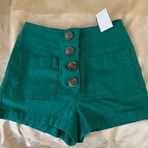 Green high waisted shorts